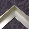 This metal canvas floater picture frame has a smooth, matte silver finish and flat, narrow (.25 ") face. 

Ideal for medium to large size artwork on thick (1.5 " deep) stretcher bars.  Border gallery wrapped Giclée canvas prints or paintings with this simple, modern frame for an authentic, fine art display.

*Note: These sturdy metal, custom canvas floaters are for stretched canvas prints and paintings, and raised wood panels.

Nielsen mf14-14 Profile