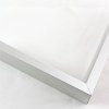 Tall, yet slim 7/16 " metal frame with a hooked profile. This moulding is white silver with a slight brushed texture. It reflects diluted light.

Nielsen n117-02 Profile