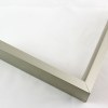 Tall, yet slim 7/16 " metal frame with a hooked profile. This moulding is dark grey silver with a slight brushed texture. It reflects diluted light.

Nielsen n117-14 Profile