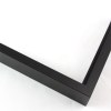 Tall, yet slim 7/16 " metal frame with a hooked profile. This moulding is frosted mars black with a slight brushed texture. It reflects diluted light.

Nielsen n117-21 Profile
