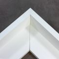 This large profile, L-shape floating canvas frame features a deep, 2-3/8 " rabbet dressed all in classic matte white. 

Display your favourite gallery wrapped canvas Giclée print or painting with authentic, fine art style. This canvas floater is ideal for large images mounted on thick (1.5 to 2 " deep) stretcher bars.

*Note: These solid wood, custom canvas floaters are for stretched canvas prints and paintings, and raised wood panels.

N7711 Piano Matte White Floater