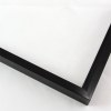 Sleek 3/8 metal frame. This frame comes in solid mars black with a mirrored finish. It is highly reflective of light and creates a blurred mirror reflection. The face is smooth and the profile has a brushed metal texture.

Nielsen oem2b Profile