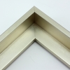 This simple, L-shape canvas floater frame features a .375 " face and deep, 1.625 " rabbet, finished with silver foil. The iridescent color varies slightly in different light, running from warm, muted gold to cool, opaque silver.

Display your favourite gallery wrapped Giclée print or painting with authentic, fine art style. These floater picture frames are ideal for medium and large canvases mounted on thick (1.5 " deep) stretcher bars.

*Note: These solid wood, custom canvas floaters are for stretched canvas prints and paintings, and raised wood panels.