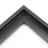This stair step wood floater frame has a matte black finish with a steep upper and small lower step. The canvas will hover neatly within the simple, modern border. 

Give an authentic, fine art display to your favourite Giclée print or oil painting. This size is ideal for thin (3/4 " deep) gallery wrap canvases. The canvas may protrude slightly above the frame face. 

*Note: These solid wood, custom canvas floaters are for stretched canvas prints and paintings, and raised wood panels.