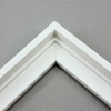 This stair step wood floater frame has a matte white finish with a steep upper and small lower step. The canvas will hover neatly within the simple, modern border. 

Give an authentic, fine art display to your favourite Giclée print or oil painting. This size is ideal for thin (3/4 " deep) gallery wrap canvases. The canvas may protrude slightly above the frame face. 

*Note: These solid wood, custom canvas floaters are for stretched canvas prints and paintings, and raised wood panels.