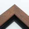 This simple but expressive floater frame features an organic wood grain face, complete with whorls and shallow ridges. The rich, matte walnut finish highlights the natural texture.

1.75" width: ideal for medium size artworks. The natural simplicity of this countryside frame is the perfect match for nature or farmland photographs or oil paintings.