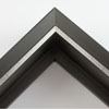 This deep, L-shape floating canvas frame features a glossy black, textured face with a brushed silver lip and deep, 1.75 " rabbet. The 45 degree angle of the face creates depth around the mounted canvas.

Display your favourite gallery wrapped Giclée print or painting with authentic, fine art style. This floater frame is ideal for medium to extra large canvases mounted on thick (1.5 " deep) stretcher bars.

*Note: These solid wood, custom canvas floaters are for stretched canvas prints and paintings, and raised wood panels.