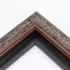 This decorative, reverse scoop stacked Floater frame features a simple relief design in bronze foil.  Distressing on the valleys of the relief create an antique effect.

Ideal for medium and large size artworks. A classical photograph, painting or print would be beautifully enhanced within this high style frame.