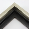 This solid wood canvas floater frame features a glossy brushed silver on the outside edge and topmost face.  The inside step and base are a matte black. 

Display your favourite gallery wrapped Giclée print or painting with authentic, fine art style. This floater frame is ideal for medium to extra large canvases mounted on thick (1.5 " deep) stretcher bars.

*Note: These solid wood, custom canvas floaters are for stretched canvas prints and paintings, and raised wood panels.