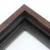 This solid wood canvas floater frame features a glossy deep walnut finish with wood grain detailing on the outside edge and topmost face.  The inside step and base are a matte black. 

Display your favourite gallery wrapped Giclée print or painting with authentic, fine art style. This floater frame is ideal for small to extra large canvases mounted on thick (1.5 " deep) stretcher bars.

*Note: These solid wood, custom canvas floaters are for stretched canvas prints and paintings, and raised wood panels.